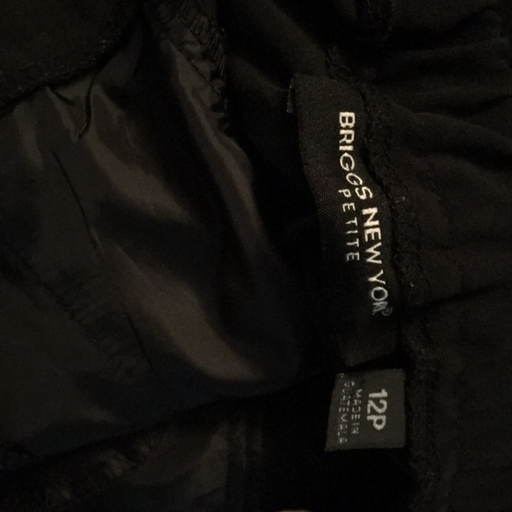 Three pair of dress ladies dress pants.